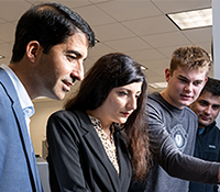 Villanova faculty member providing instruction to students.